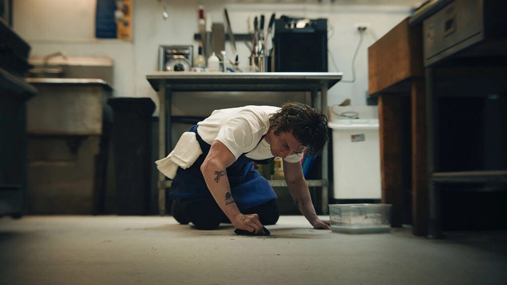 Carmy (Jeremy Allen White) scrubbing the floor in 'The Bear'