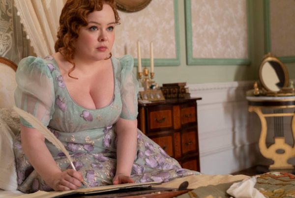 Penelope Featherington (Nicola Coughlan) writing in her bed in 'Bridgerton,' How You Can Embrace Size Inclusivity in Your Screenplay